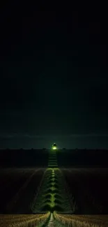 Mysterious night scene with green light on a dark road wallpaper.