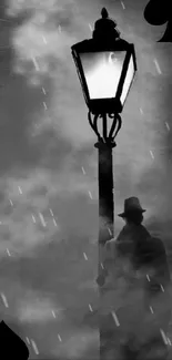 Noir streetlight with spades in foggy night scene.