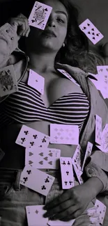 Woman with poker cards in a mysterious fashion pose.