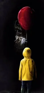 A mysterious figure with a red balloon and a child in a yellow raincoat stands in darkness.