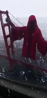 Hooded figure in red cloak standing by a bridge in stormy weather.