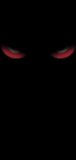 Dark wallpaper with glowing red eyes.