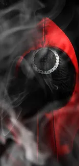 Dark graphic wallpaper of a red hooded figure with a hidden face.