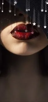 Elegant mobile wallpaper with mysterious red lips in dark shadows.