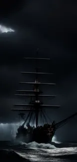 Dark sailing ship on stormy ocean at night.