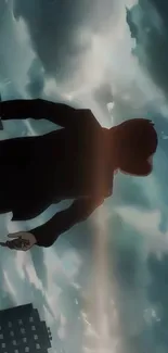 Silhouette of a person against a cloudy, dramatic sky.