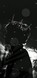 Silhouette with crown against a smoky background, creating a mysterious ambiance.