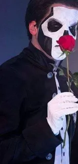 Figure in skull mask holding a red rose.