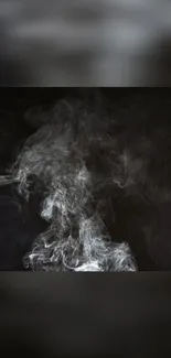 Mysterious swirling smoke on a dark background wallpaper.