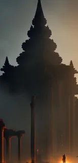 Silhouetted temple with orange dusk backdrop.