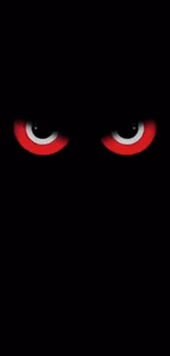 Dark wallpaper with glowing red eyes.