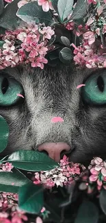 Enchanting cat with vibrant green eyes surrounded by pink blossoms.