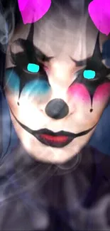 Mystic clown with vibrant makeup and neon eyes in smoky background.