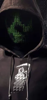 Dark hooded figure with digital green skull face wallpaper.