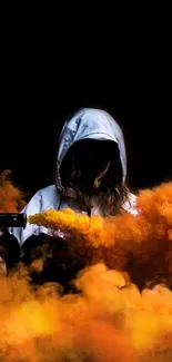 Hooded figure surrounded by vibrant orange smoke on a dark background.