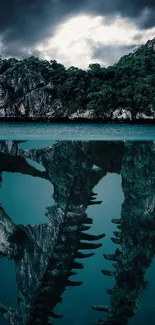 Island landscape with a skull reflection on water, dramatic sky, and lush greenery.