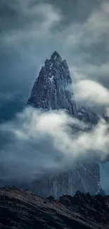 Majestic mountain peak with clouds on mobile wallpaper.