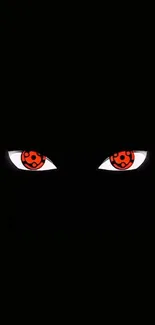 Dark wallpaper featuring mystic red eyes on a black background.