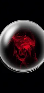 Mystic red orb with swirling effect on a black background.