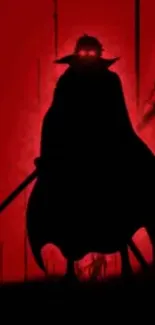 Mystic silhouette of a figure against a red backdrop.