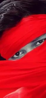 Portrait with red veil covering face, eyes visible, mysterious wallpaper design.