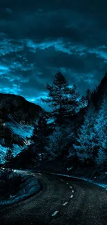 Winding road at night through a moonlit, dark blue forest.