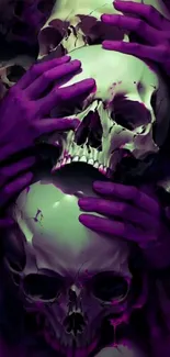 Purple hands cradle eerie skulls on a dark background.