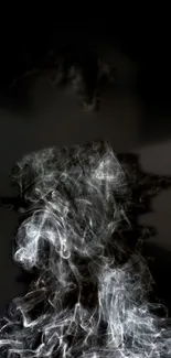 Mysterious swirling white smoke on a dark background wallpaper.