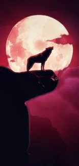 Wolf silhouette under a red moon on a dark night