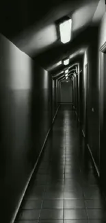 Dimly lit, black hallway with mysterious ambiance.