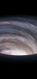 Black hole vortex with swirling cosmic colors on a dark background.