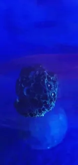 A mystical blue bubble sphere against a dark blue background.