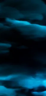 Dark cyan wallpaper with mystical blue clouds.