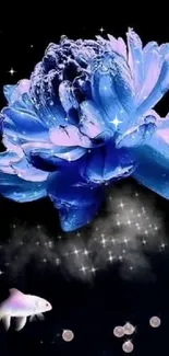 A mystical blue flower with a fish on a starry night wallpaper.