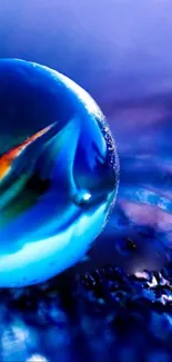 Mystical blue orb with vibrant colors on textured surface.