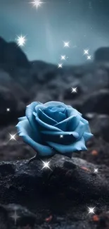 Mystical blue rose on dark rocky ground under a starry sky.