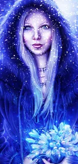 Mystical woman in blue cloak with flowers in winter scene.