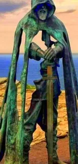 Bronze statue with sword by the sea, mystical atmosphere.