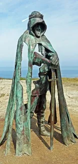 Bronze warrior statue overlooking the sea on a coastal cliff.