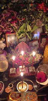 Candlelit altar with foliage and vibrant decor in a mystical setting.