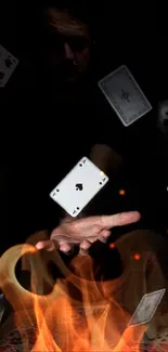 Mobile wallpaper showing playing cards and orange flames.