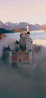 Mystical castle surrounded by morning fog with mountains in the background.