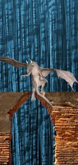 Mystical creature on brick wall against blue background wallpaper.