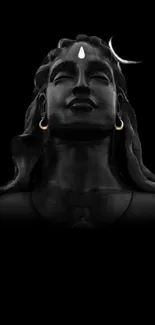 Mystical statue of Shiva in dark wallpaper.