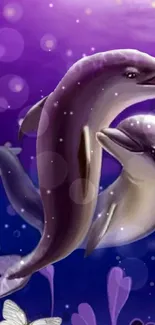 Beautiful dolphin duo with purple ocean background.