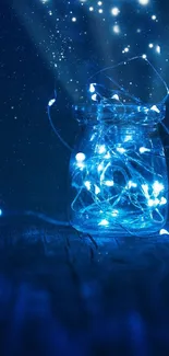 Mystical blue fairy light jar glowing in the dark.