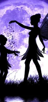 Silhouette of fairies against a purple moonlit night.