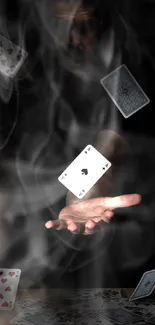 Mystical image of floating playing cards in a dark setting.