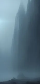 Ethereal foggy canyon with rock formations and mist.