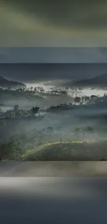 Mist-covered forest with rolling hills and morning light.